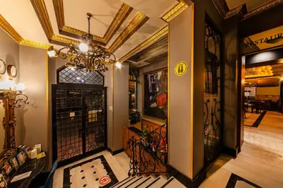 a hallway with a chandelier and a entry way at Santa Ottoman Hotel in Istanbul