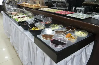 a buffet line with many different types of food at Cumbali Suite Hotel in Istanbul