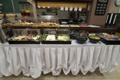 a buffet line with many different types of food at Cumbali Suite Hotel in Istanbul
