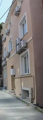 a building with windows on the side of a street at The Lola Hotel in Istanbul