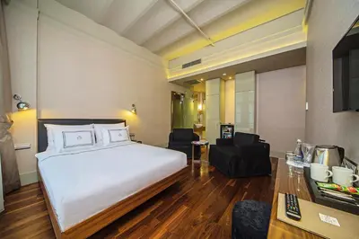 a hotel room with a bed and a desk at The Haze Karaköy in Istanbul