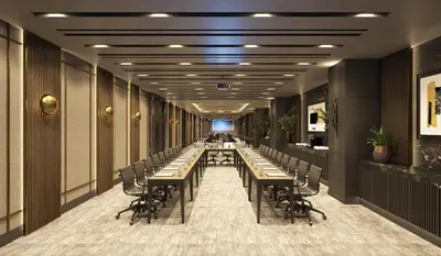 a long corridor with long tables and chairs at Arts Hotel Taksim in Istanbul
