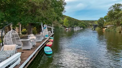 a group of boats are docked on a river at Ağva Acquaverde Otel in Agva