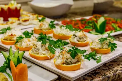 a plate of food with appetizers on a table at Golden Crown Hotel in Istanbul