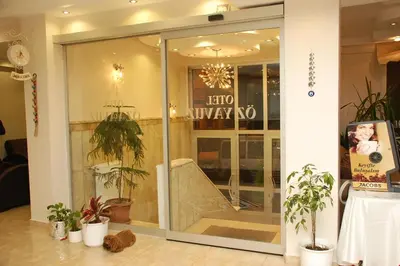 a store front with a sliding glass door at Topkapı Otel Özyavuz in Istanbul
