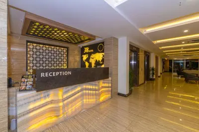 a hotel lobby with a reception sign on the wall at 38 Hotel in Istanbul