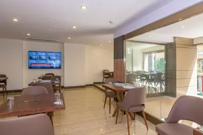 a restaurant with tables and chairs in a room at 38 Hotel in Istanbul
