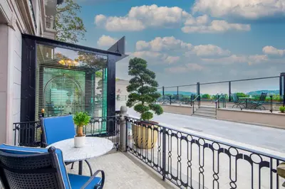a balcony with a table and chairs and a view at MFB Tarabya Hotel in Istanbul