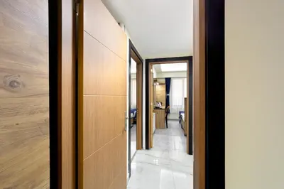 a hallway of a house with a door and a room at Vizyon Hotel - Old City in Istanbul
