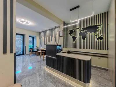 a lobby with a world map on the wall at ROYAL TAKSIM SUITES in Istanbul