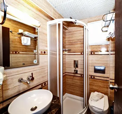 a bathroom with a shower and a sink at Elysion Hotel in Istanbul