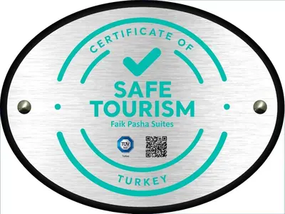 a sign for a gate tourism facility pasta suites at Faik Pasha Hotels Special Category Beyoglu Istanbul in Istanbul