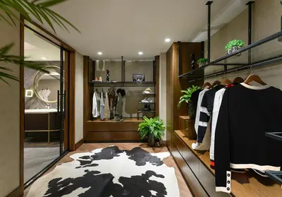 a walk in closet with a black and white shirt at Elite World Grand Sapanca in Sapanca
