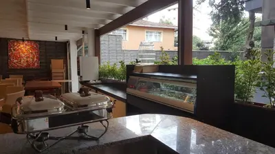 a kitchen with two pots on a counter and a grill at Princess Residence in Istanbul