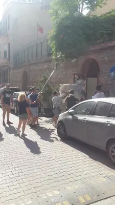 a group of people standing next to a car at YOLO Hostel in Istanbul