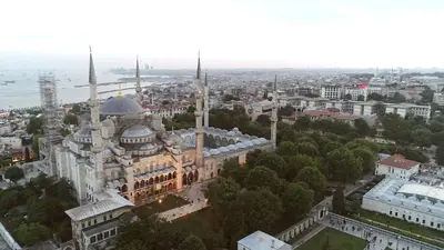 an aerial view of a building with two mosques at Eastanbul Suites in Istanbul