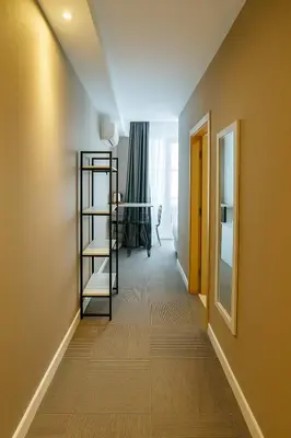 a long hallway with a ladder in a room at Blue Point Hotel in Istanbul