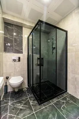 a bathroom with a shower and a toilet at Gul Otel in Istanbul