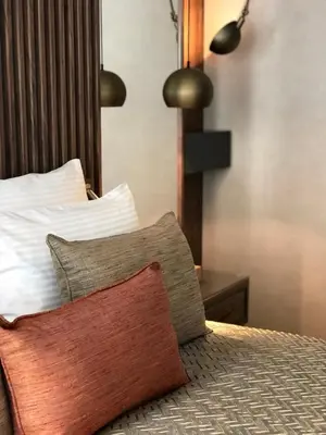 a bedroom with a bed with a pillow on it at Levni Plus Hotel in Istanbul