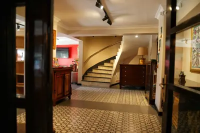 a hallway with a spiral staircase in a house at Nomade Old City Hotel in Istanbul