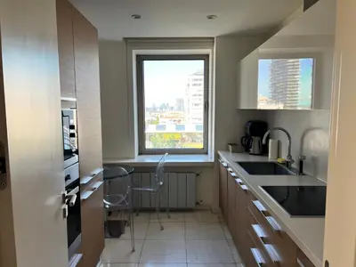 a kitchen with a sink and a window at Akmerkez Residence in Istanbul