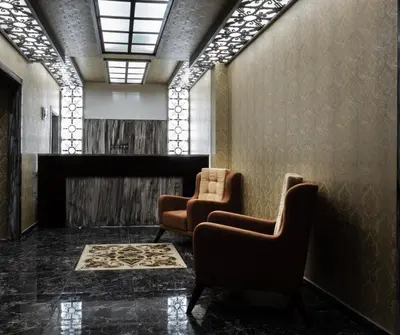 a waiting room with two chairs at Araz Suit in Burgaz