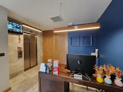 an office with a desk with a computer on it at Taksim Landhouse Hotel in Istanbul
