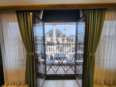 a balcony with a view of a building at Taksim Landhouse Hotel in Istanbul
