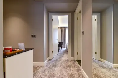 a hallway with a hallway leading into a room at Kare Hotel Sultanahmet in Istanbul