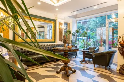 a living room with a couch and a table at Myy Boutique Hotel in Istanbul