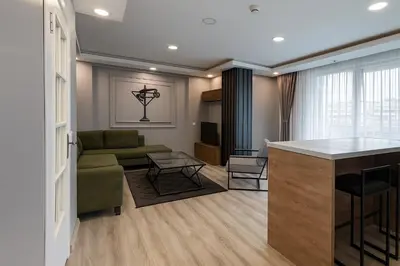 a living room with a couch and a table at On4 Rooms & Suites in Istanbul