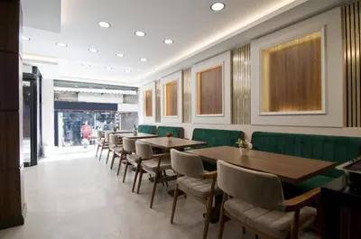 a row of tables and chairs in a restaurant at Grand Bagoz Hotel in Istanbul