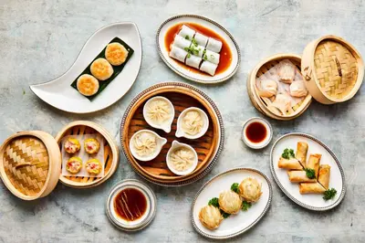a group of bowls filled with different types of food at Shangri-La Bosphorus, Istanbul in Istanbul