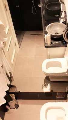 a bathroom with a toilet and a sink at Frida Suites in Istanbul