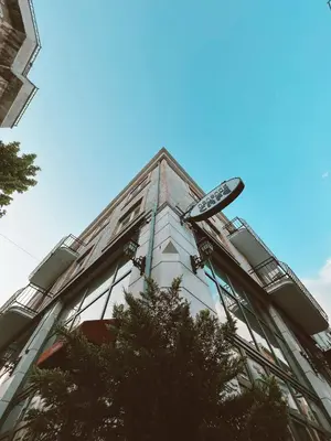 a building with a sign on the top of it at HANENDE HOTEL in Istanbul