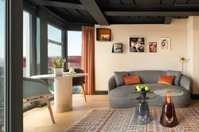 a living room with a couch and a table at Stay Lab Residence in Istanbul