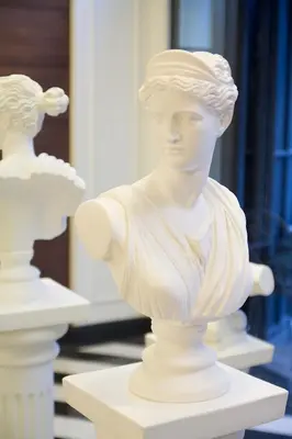 a white bust of a woman on a table at The 22 Hotel in Istanbul