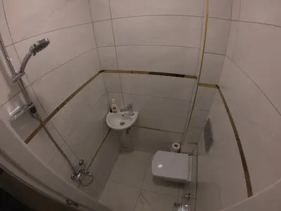 a small bathroom with a sink and a toilet at PASHA APART~BOUTİQUE HOTEL/YALOVA in Yalova