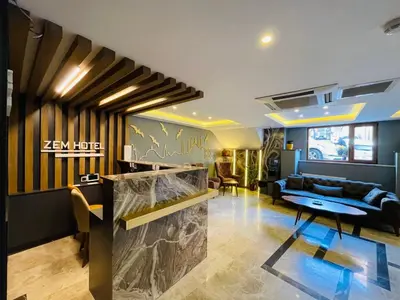 a living room with a couch and a table at Zem Hotel in Istanbul