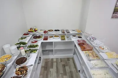 a buffet line with many different types of food at BEKSİTİ HOTEL in Yalova