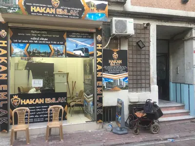 a store window with a stroller in front of it at Çatı Apartment in Istanbul