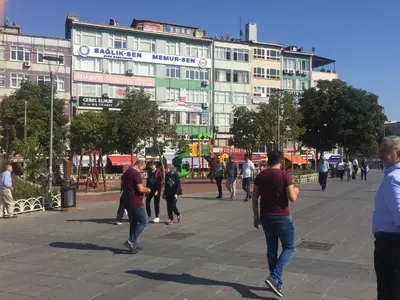a group of people walking on a city street at Yakup's Apartment in Istanbul