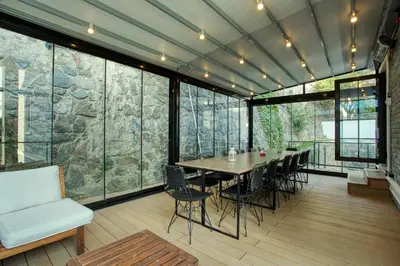 a large dining room with a table and chairs at DM Suites Bosphorus in Istanbul