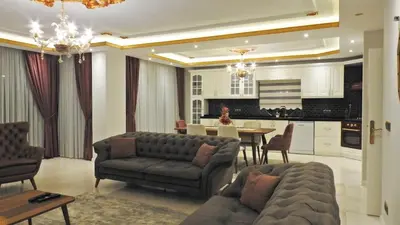 a living room with a couch and a table at Bahar Villas Sapanca in Sapanca