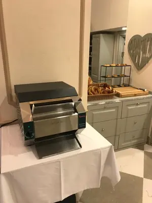 a printer sitting on top of a table at GALATAHAN Hotel Istanbul Karakoy in Istanbul