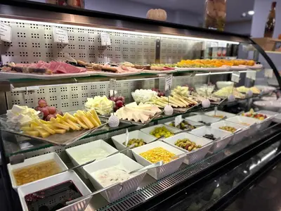 a display case filled with different types of food at Akka Suites Taksim-Special Class in Istanbul