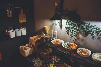 a table with many bowls of food on it at LUXIR HOTEL in Istanbul
