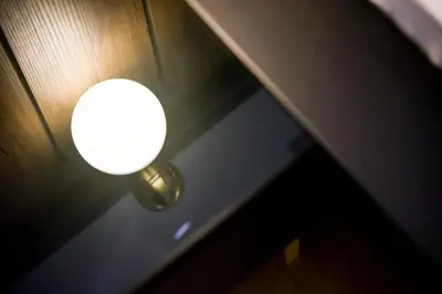 a light on a wall with a light on it at LUXIR HOTEL in Istanbul