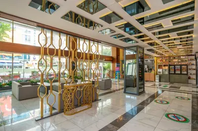 a lobby of a building with glass windows at The Bostancı Otel in Istanbul