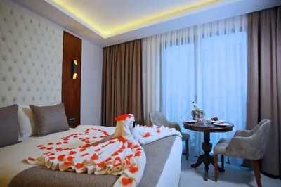 a hotel room with a bed and a table at My Dream Istanbul Hotel in Istanbul